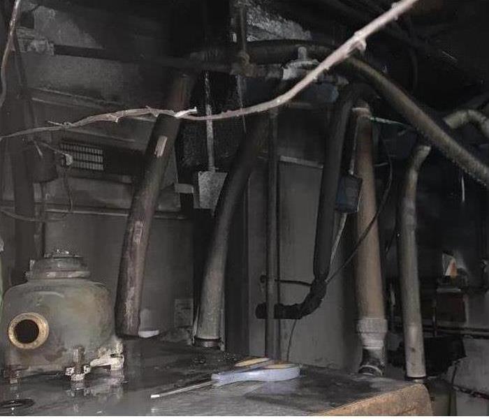 Soot all over piping at a commercial fire job